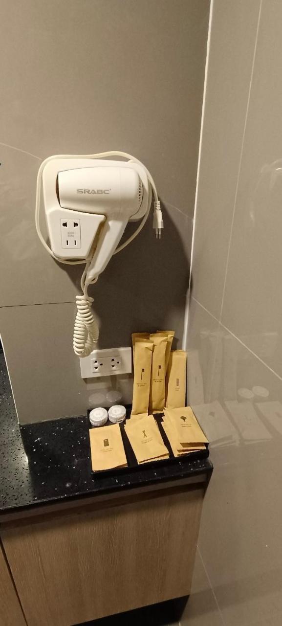 The Airport Courtyard Suvarnabhumi Airport Bangkok Zewnętrze zdjęcie A hair dryer in a hotel bathroom